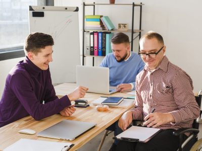 group-adult-workers-together-office